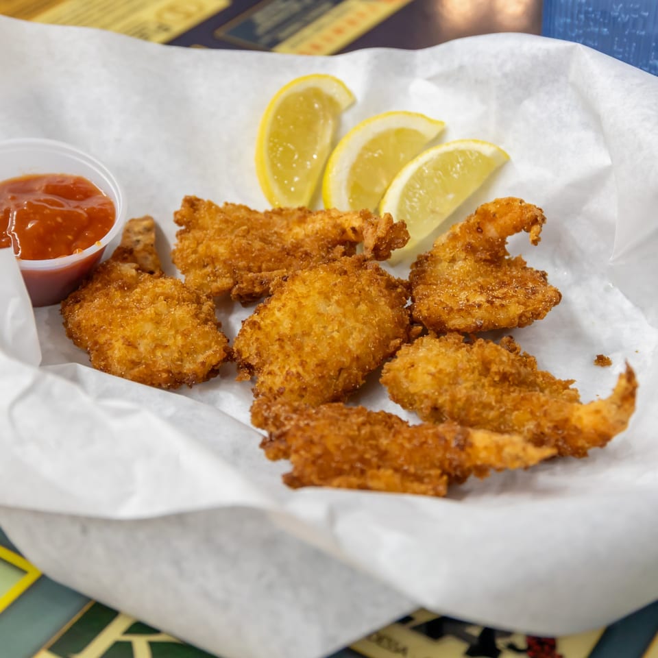 Golden fried shrimp with lemon and cocktail sauce at Big Daddy's.