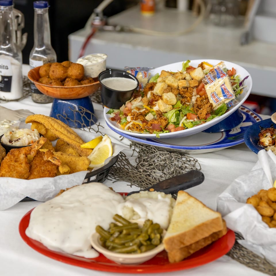Fried seafood, Club Salad, and grilled shrimp at Big Daddy's.